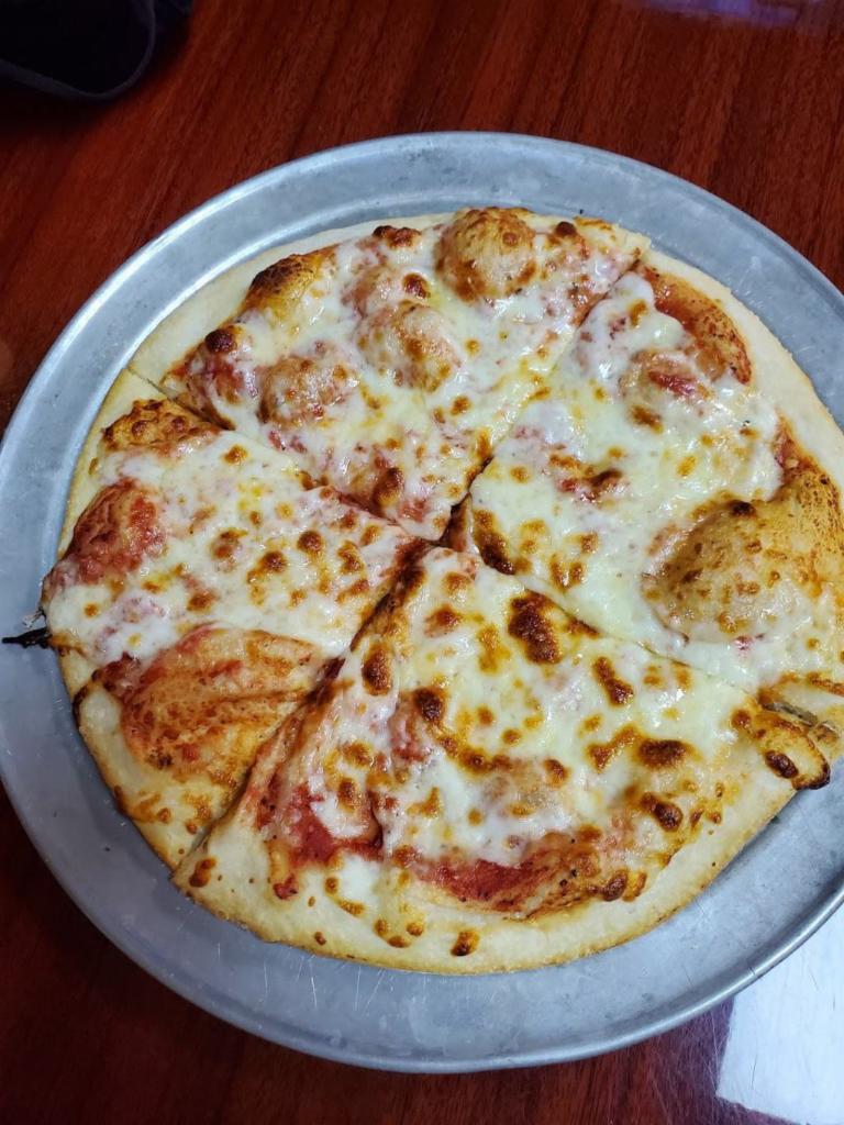 Manhattan Chicago  Kendall · Italian · Pizza · Salad