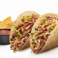 Dos Chipotle Bbq Pork Tacos · Carnitas style pork, bacon, chipotle BBQ sauce, spicy mayo, crispy onions, chipotle slaw, an...