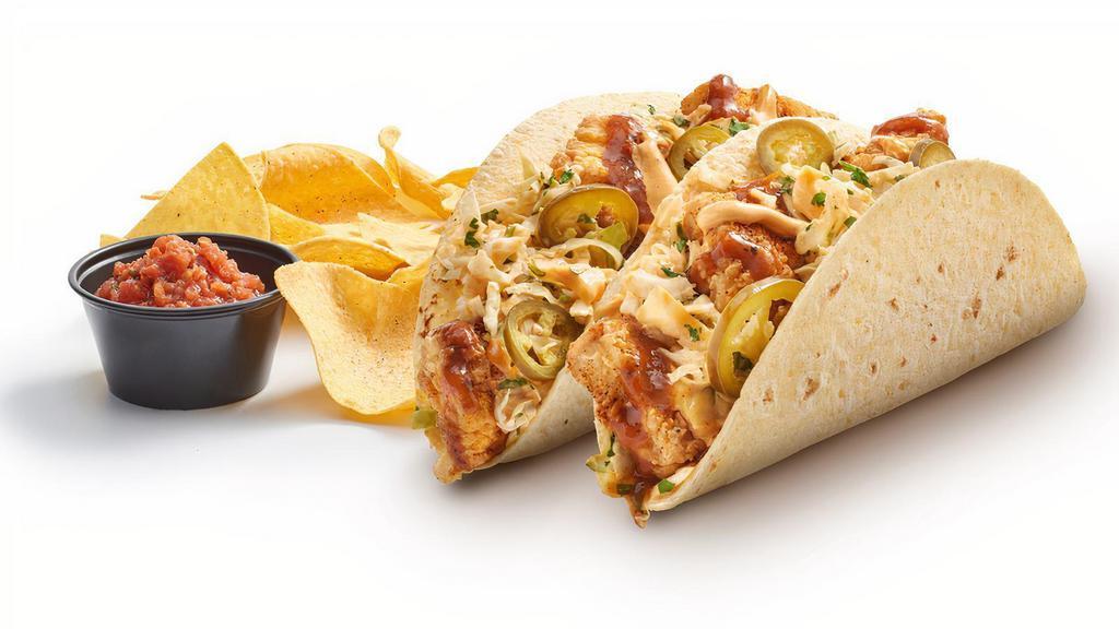 Dos Chipotle Baja Fish Tacos · Crispy cod, chipotle salsa, spicy mayo, chipotle slaw, and pickled jalapeños in soft corn flour blend tortillas. Served with chips and salsa