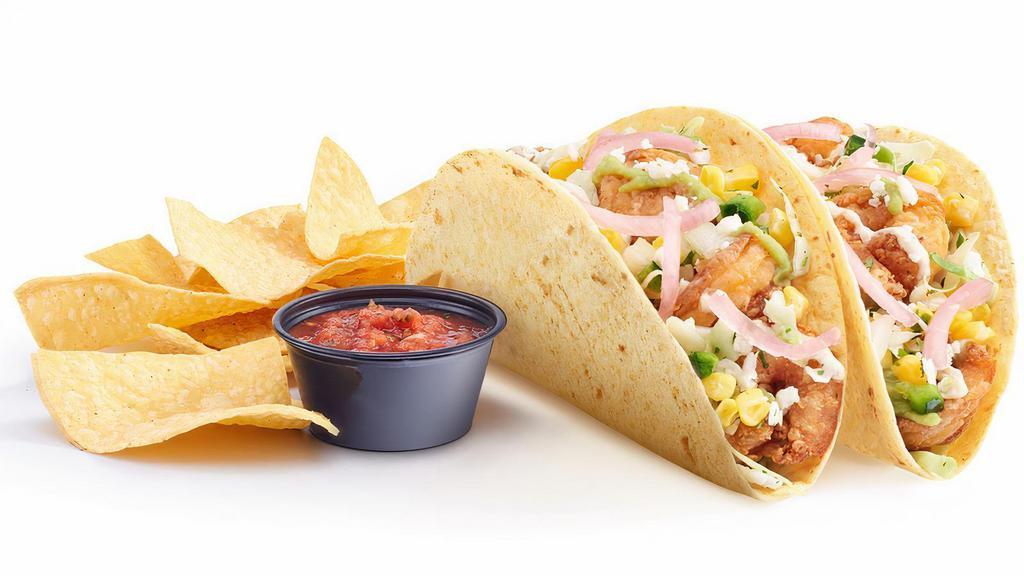 New! Dos Crispy Shrimp & Corn Tacos · Crispy fried shrimp, avocado sauce, cilantro cabbage, corn salsa, garlic lime sauce drizzle, queso fresco, and pickled red onions in soft corn and flour blend tortillas. Served with salsa.