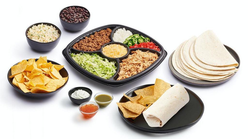 Burrito Take-Home Meal Kit · Includes choice of 6 large soft flour or wheat tortillas, chicken, beef, cilantro lime rice, beans, toppings and chips. Feeds up to six people. $7 extra for steak. 610-730 CAL Per Serving.