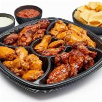 Wings Take-Home Meal Kit · 30 wings with choice of up to 2 flavors. Includes ranch dipping sauce, large salsa and chips...