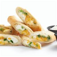 Atom Bombs · Lightly fried flour tortillas, cream cheese, fresh jalapenos, and cheese. Served with Smack ...