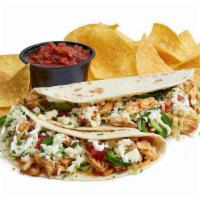 Smokin’ Chipotle Chicken Tacos · Chicken Tinga has a new name, and the same bold taste you love! Shredded chipotle chicken, s...