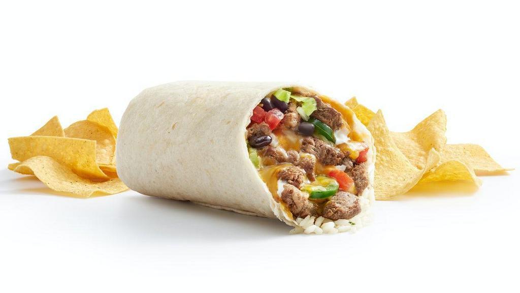 Megajuana Burrito · Double meat and double cheese in a flour or wheat tortilla, cilantro lime rice, refried or black beans. Served with a side of chips. 1177-1783 CAL