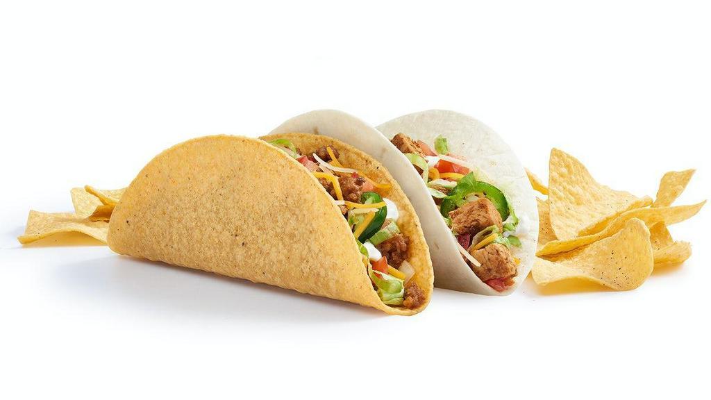 Dos Tacos Mix And Match · Hard corn, soft flour or wheat tortilla, and choice of 1-2 fillings and toppings. Served Tijuana style, and with a side of chips.. Make it a Double Stack with a soft tortilla, covered in queso wrapped around a crunchy shell. 785-1072 CAL