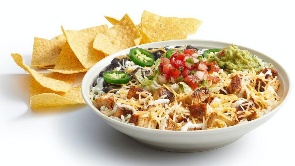 Megajuana Bowl · Double meat and double cheese with cilantro lime rice or fresh romaine lettuce, refried or black beans, cheese, pico, jalapeños, sour cream, and guac. Served in a bowl with a side of chips. 1,098 - 1,630 CAL