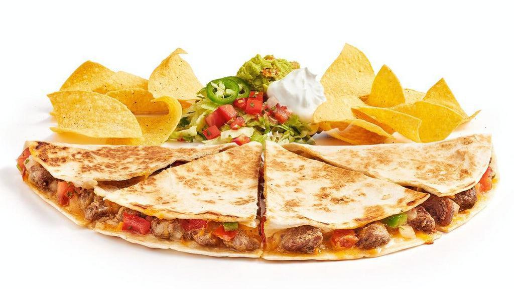 Quesadilla · Grilled flour or wheat tortilla, melted cheese, and pico. Served with sour cream, guac, and jalapeños. Served with a side of chips. 681-1089 CAL