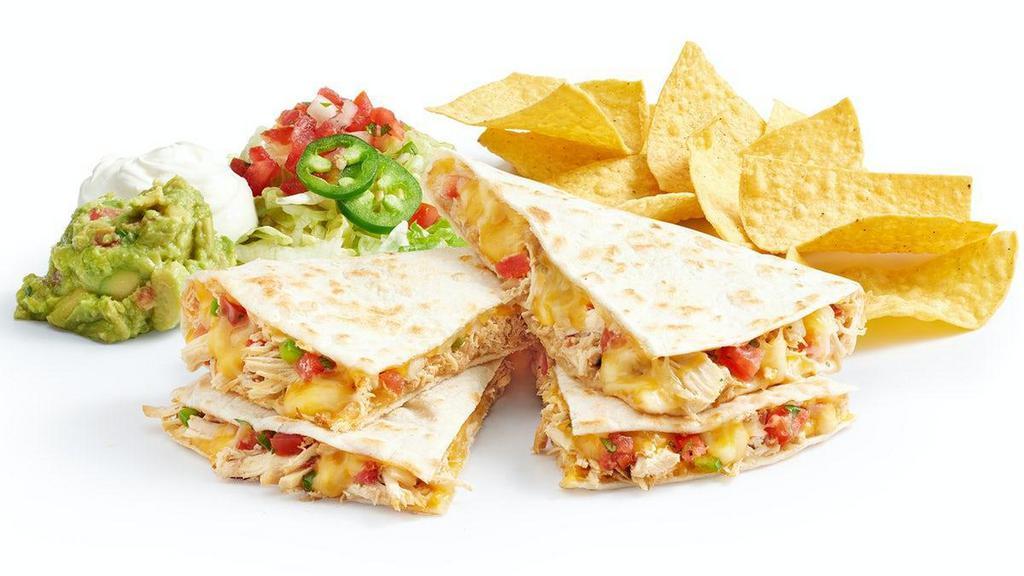 Megajuana Quesadillas · Double meat and double cheese in a grilled flour or wheat tortilla, melted cheese, and pico. Served with sour cream, guac, and jalapeños. Served with a side of chips. 825 -1,554 CAL