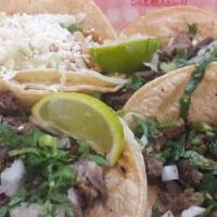 Chorizo · All tacos contain onions and coriander.