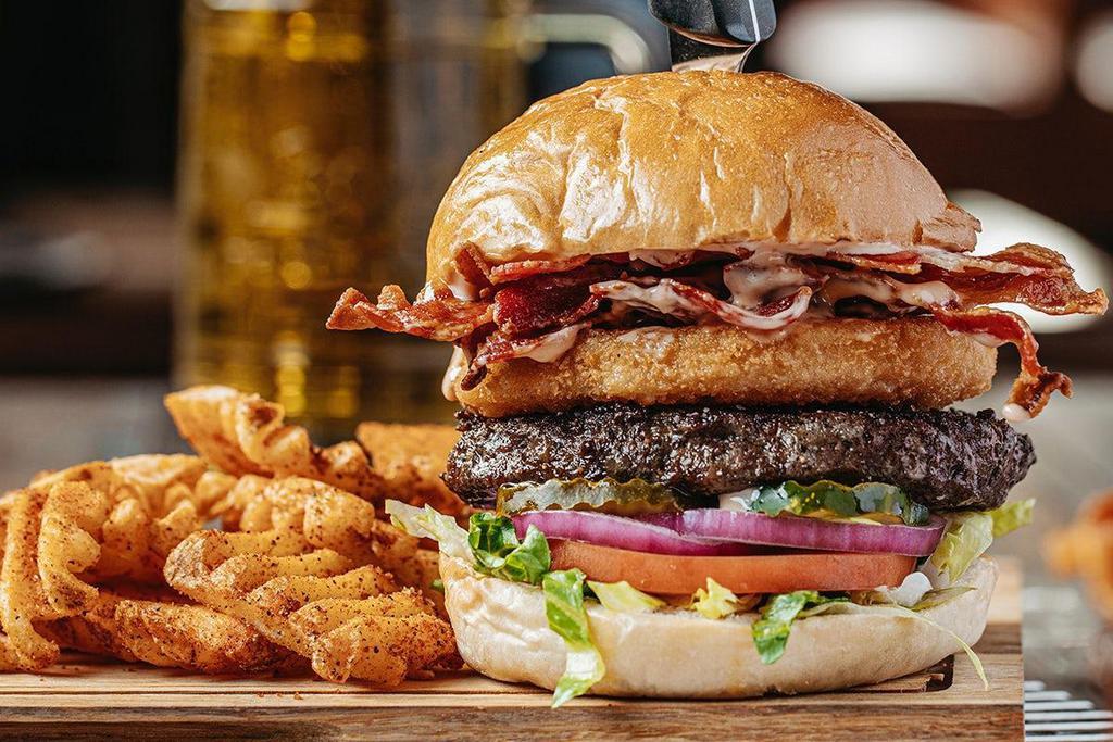 Backstage Pass · Sneak behind the curtain for a juicy burger topped with fried cheese and thick-cut bacon