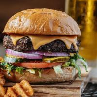 Chart Topper  · Always a crowd favorite, this burger is topped with your choice of Swiss, American or chedda...