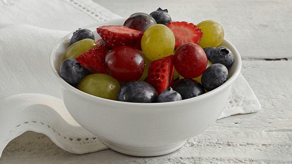 Fresh Fruit · Chilled, freshly cut strawberries, blueberries and red & white seedless grapes.