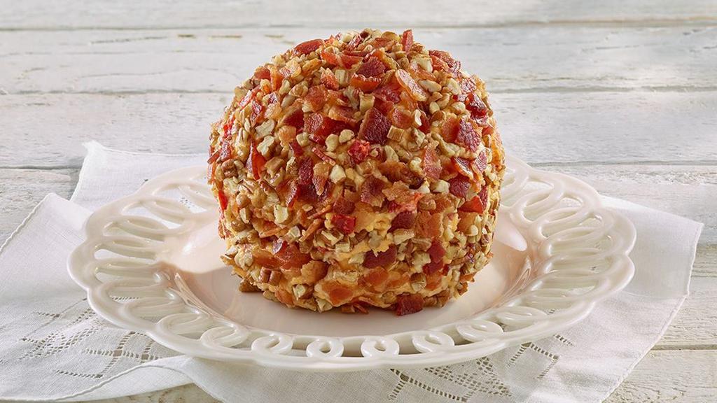 Spicy Pimento Cheese Ball · Our homemade spicy pimento cheese covered in crunchy pecans and crispy bacon.