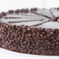 Divine Chocolate Cake Whole · Chocolate cake covered with chocolate icing then layered with fudge topping and chocolate ch...