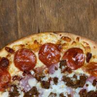 Carnivore Pizza  · Hand-stretched dough with marinara, mozzarella cheese, pepperoni, ham, bacon, beef, and saus...