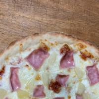 Hawaiian Pizza · Hand-stretched dough with marinara, mozzarella cheese, ham and pineapple.