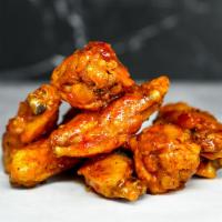 6 Classic Bone-In Wings · 6 Classic bone-in chicken wings tossed with wing sauce and served with fresh carrot & celery...