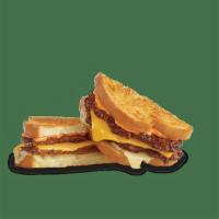 Frisco Melt · American and Swiss on buttery grilled sourdough with our original Frisco sauce.