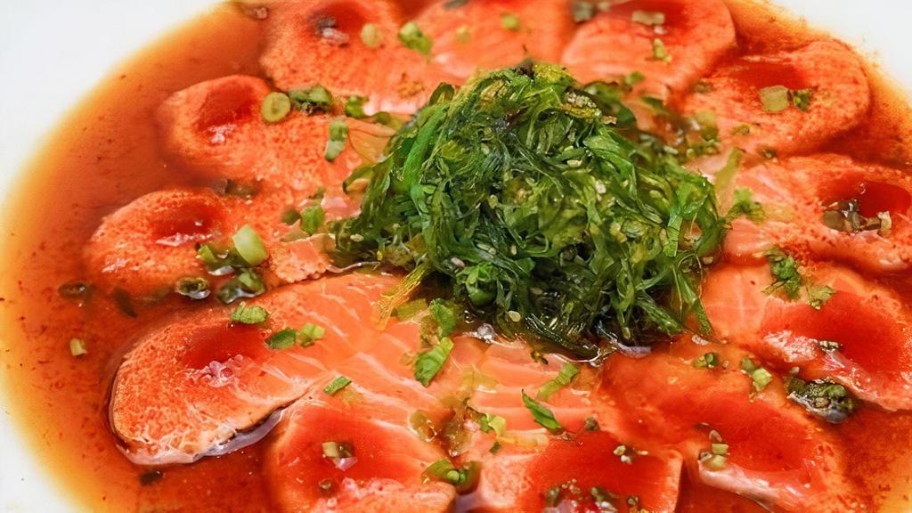 Salmon Truffle Ponzu · Thin sliced asc salmon, seaweed salad, truffle oil, spicy ponzu sauce