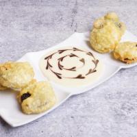 Tempura Oreos · Served with sweet condensed milk dipping sauce + Oreo cookie crumbles