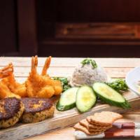 Island Sampler · Conch fritters, oysters, smoked wahoo dip, coconut shrimp, crab cakes.