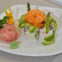Volcano Roll · Cream cheese, Kani, and asparagus topped with avocado and scallop dynamite.