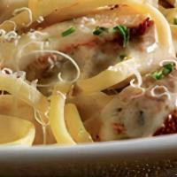Cajun Chicken Alfredo Family Meal · served with house salad with choice of dressing and garlic bread