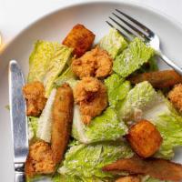 Caesar Salad · Romaine hearts, crispy okra, garlic grit croutons, and Grana Padano. Consuming raw or underc...