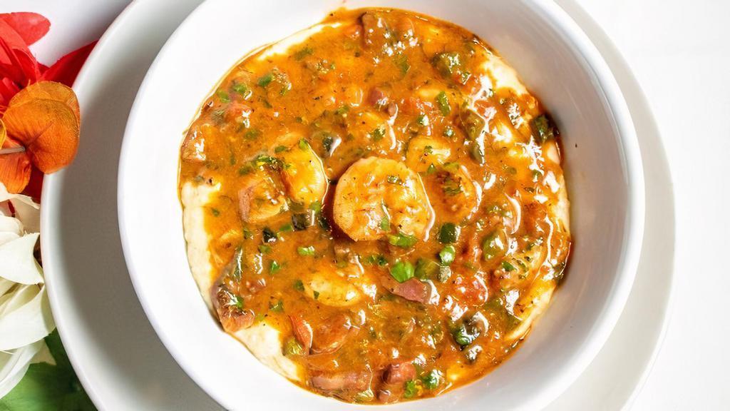 Shrimp & Marsh Hen Mill Grits · Our tasso ham smoked tomato-poblano gravy. Consuming raw or undercooked meats, poultry, seafood, shellfish or eggs may increase your risk of foodborne illness.