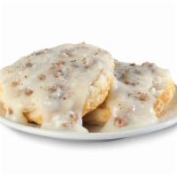 Sausage Gravy Biscuit (A La Carte) · One of our zesty sausage biscuit served open faced and topped with our creamy sausage cajun ...