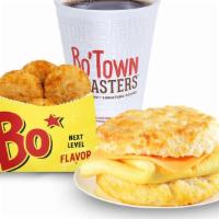 Egg & Cheese Biscuit (Combo) · One of our homemade buttermilk biscuits topped with an egg and a slice of American cheese, s...