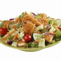 Chicken Supremes® Salad · 3 crispy, Cajun Spiced, boneless Chicken Supremes® served on a bed of fresh romaine lettuce,...