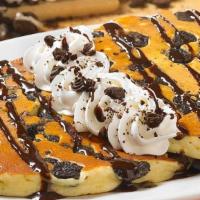Oreo® Cookie Crunch Sweet Cakes · Pancakes Perfected: Two platter-sized, thick and fluffy pancakes, topped with sweetness and ...