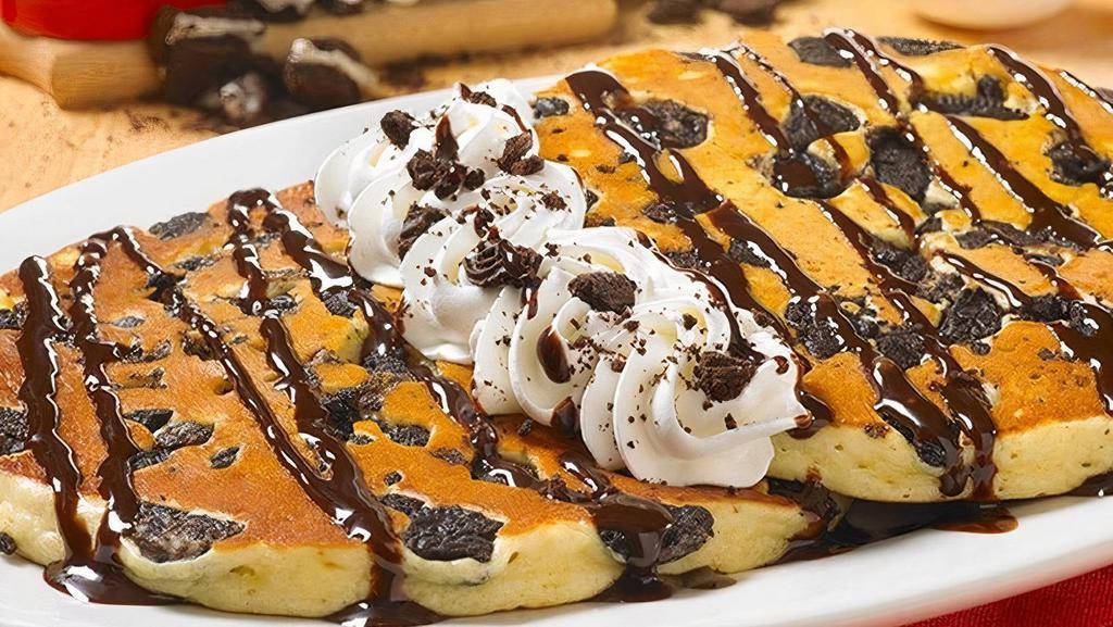 Oreo® Cookie Crunch Sweet Cakes · Pancakes Perfected: Two platter-sized, thick and fluffy pancakes, topped with sweetness and stuffed with crushed OREO® cookies and topped with cookie crumbles, rich chocolate syrup and whipped topping (Cal 980)