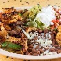 Texanas Fajita · Served with salad, tortillas, rice beans.