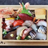 Chirashi Sushi Box · Sliced assorted sashimi, vegetables, sushi rice.