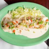 Wet Burrito · Flour tortilla, filled with cheese, rice, and beans, choice of meat, Top with melted cheese,...