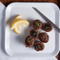 Beef Negimaki · Six pieces of thinly cut broiled beef rolled with scallions.