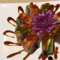 Baby Moon Roll · Crab, scallop baked with spicy mayo top with smoked salmon, masago served with eel sauce.