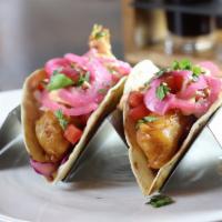 Baja-Style Fish Tacos · Vienna Red Lager-battered haddock, red cabbage. slaw, pickled onion, pico de gallo, chipotle...