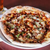 Voodoo Chicken Pizza · smoked gouda, mozzarella, green pepper, red onion, bacon, spicy Vienna Red Lager barbeque sa...