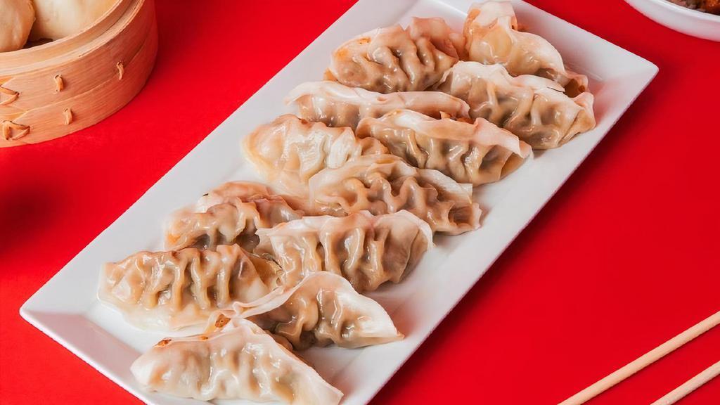 12 Pack Dumplings · Steamed with your choice of Green Vegetable or Ginger Chicken.