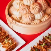 The Party Bundle · Perfect for a larger crowd of 8-12 people.. The Party Bundle is 24 of our signature bao (6 e...