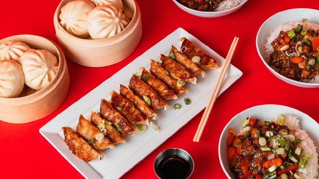 The Family Bundle · An easy meal for 4-5 people.. The Family Bundle is a combination of our fan favorites with 3 BBQ Berkshire Pork bao, 3 Spicy Mongolian Beef bao, 12 pan-seared Ginger Chicken potstickers, and 3 Teriyaki Chicken bowls.
