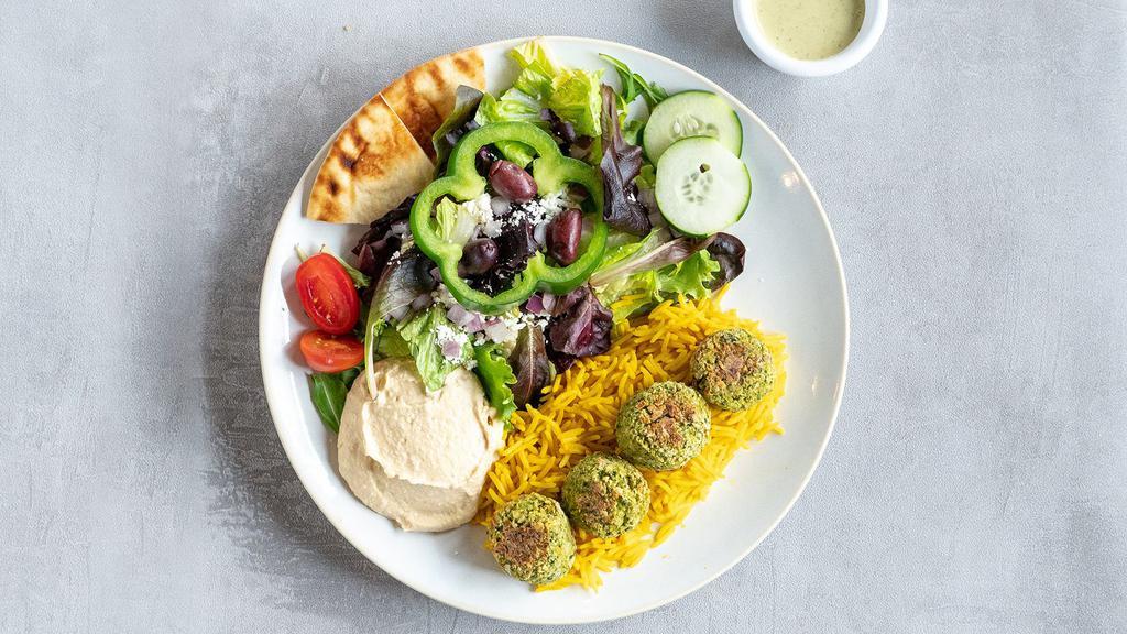Falafel & Salad Plate · Greek salad with rice, falafel, Classic Hummus, and Lemon Herb Tahini. Served with pita.