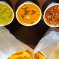 Triple Dip Appetizer · Guacamole, Queso, Pico de Gallo and Chips. Serves up to 4 people.