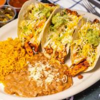 Loaded Tacos · 3 tacos. Topped with lettuce, pico de gallo, guacamole, cheese, and Chipotle cream. Served w...