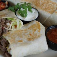 Steak Burrito · Made with lettuce, rice, beans, pico de gallo, chipotle cream, and cheese, wrapped in your c...