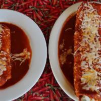 Steak Wet Burrito · Made with lettuce, rice, beans, pico de gallo, chipotle cream, and cheese in a flour or whea...